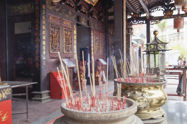 Burning Joss Sticks at Chinese Temple