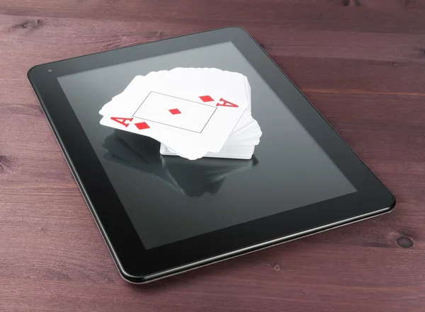 Deck of playing cards on digital tablet pc, concept of texas poker online