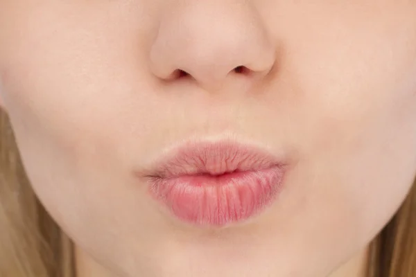 Female kiss lips close up