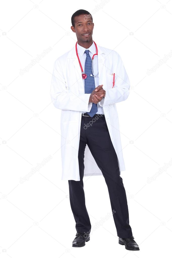 Studio full length shot of a doctor with white coat and