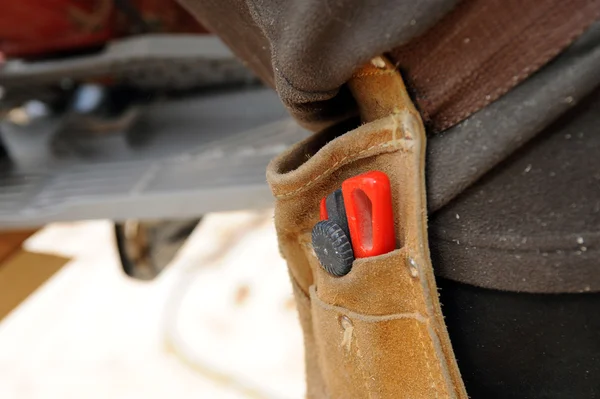 Close-up of workers tool-belt