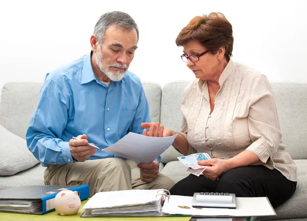 Couple calculating home finances