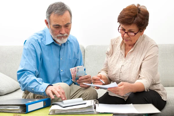 Couple calculating home finances