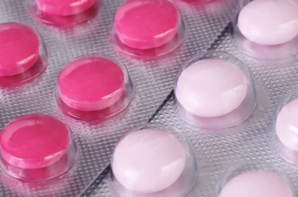 Red and pink tablets