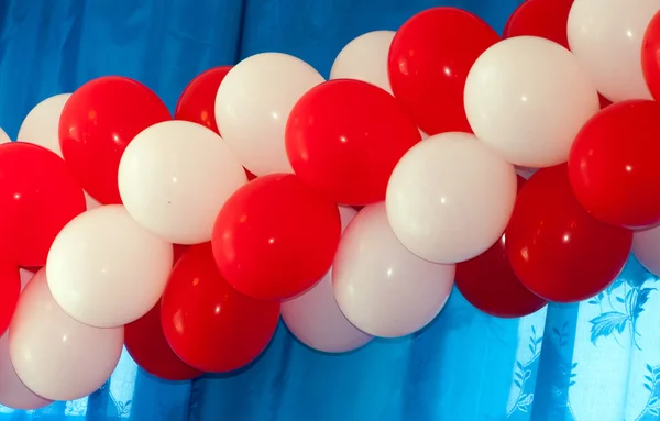 Red and white balloons