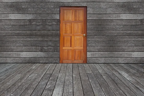 Wall with door and floor siding weathered wood background