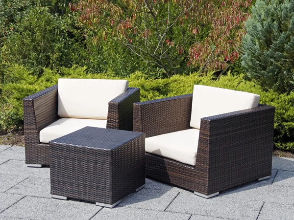 Outdoor furniture rattan armchairs and table