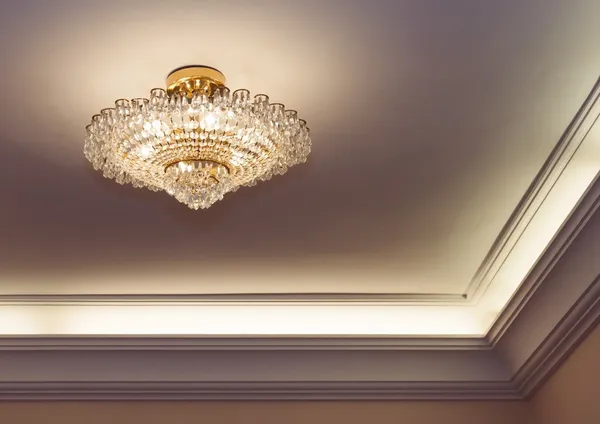 Crystal chandelier hanging on ceiling