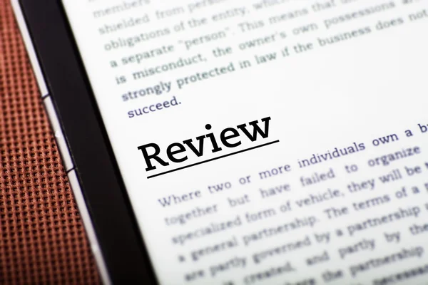 Review on tablet screen, ebook concept