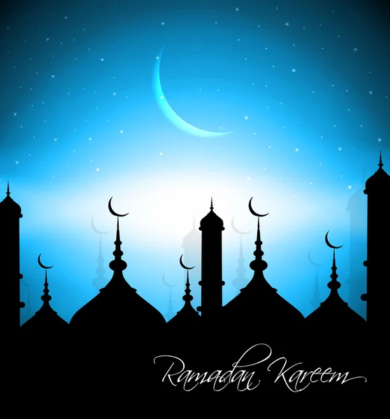 Beautiful mosque with bright colorful Ramadan Kareem on blue bac