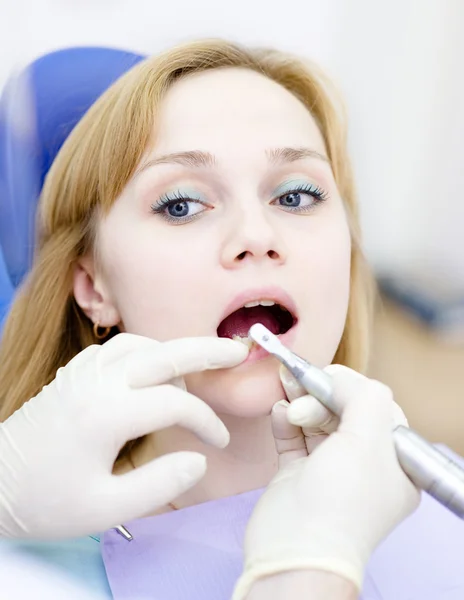 Medical dentist procedure of teeth polishing with cleaning from