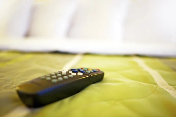 TV Remote on Bed — Stock Photo #36153001