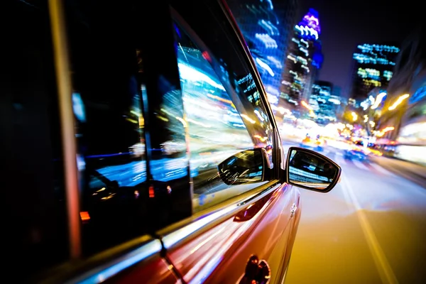 Driving Through City Lights