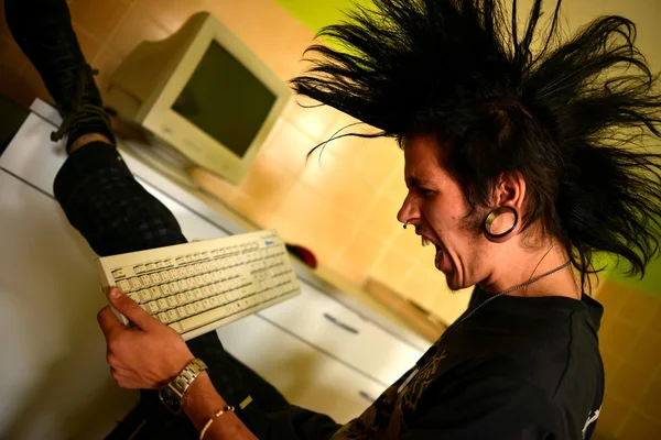 Punk boy with keyboard