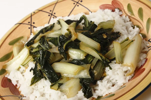 Sauteed bok choi on a bed of jasmine rice