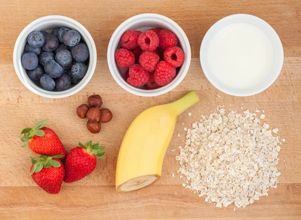 Ingredients for oatmeal with fresh fruit