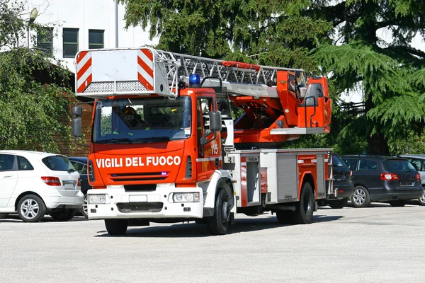 Aerial fire truck in the race during a mission