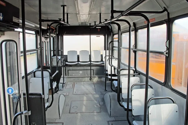 Empty seats inside the bus for urban transport of persons