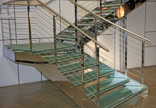 Internal staircase made of steel and glass in a public administr