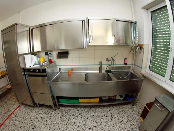 Industrial stainless steel sink kitchen of a school canteen