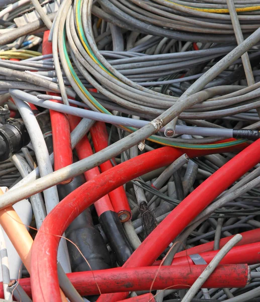 Obsolete electrical cables and copper cables in a container for