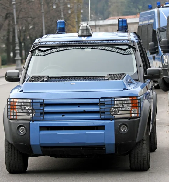 Police SUVs in the middle of the road during a roadblock