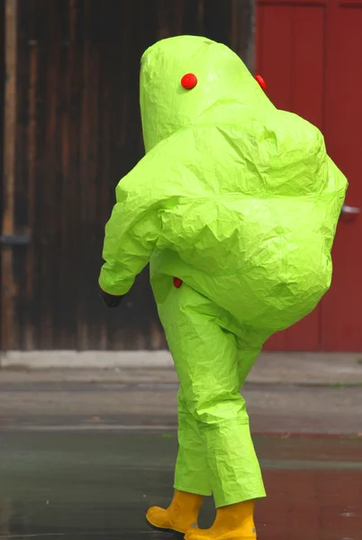 Man with the yellow suit and breathing apparatus to enter contam