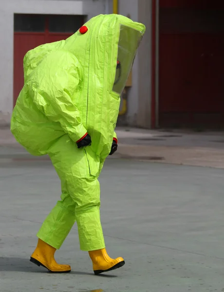 Man with the suit and breathing apparatus to enter contaminated