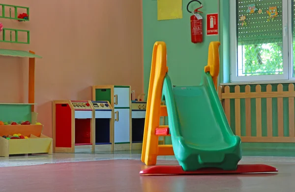Slide and games inside a school for young children