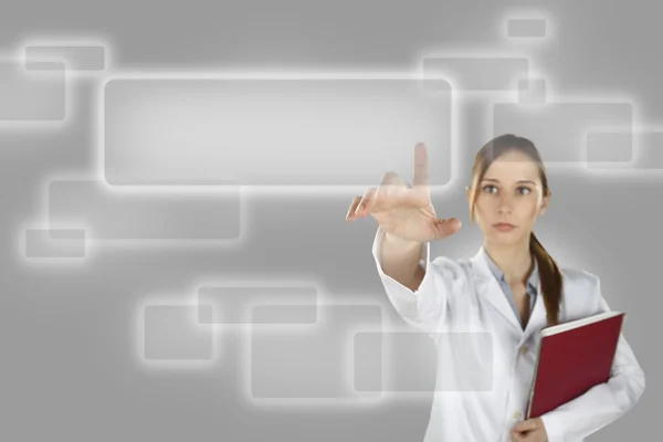 Medical . Young doctor woman pointing on a virtual screen