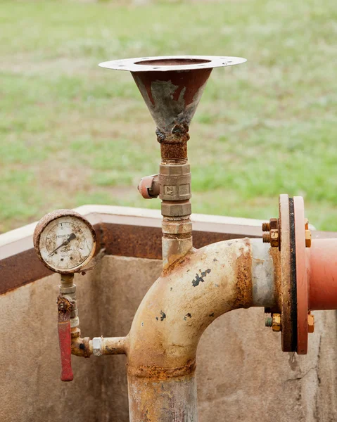 Old of gage meter and water pipe
