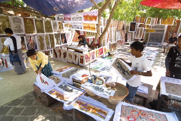 Sand paintings for sale outside a temple