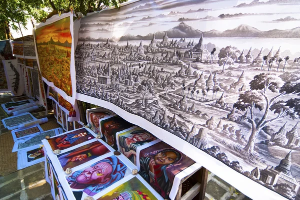 Sand paintings for sale outside a temple