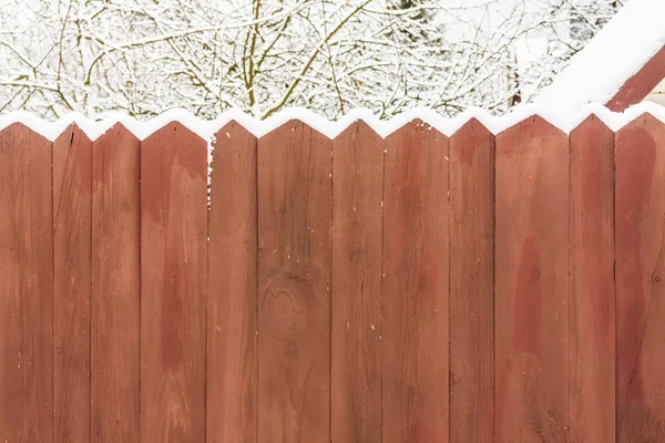 Old Wooden Fence In A Snow