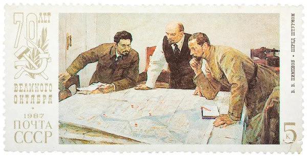 Stamp printed in Russia shows Lenin planning strategy with two g