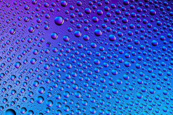 Water drops spectral gradient blue purple ocean colors rainbow colorful beading lotuseffekt tau sealing