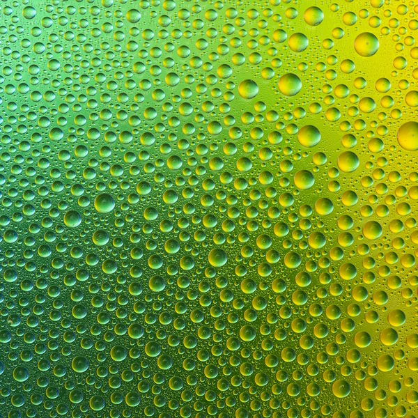 Waterdrops spectral gradient green gold yellow nature colors rainbow colorful beading lotuseffekt tau sealing