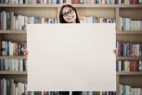 Asian woman showing empty banner