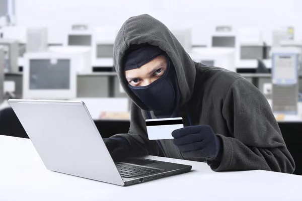 Hacker stealing credit card numbers