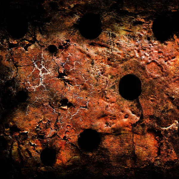 Grunge wall with bullet holes