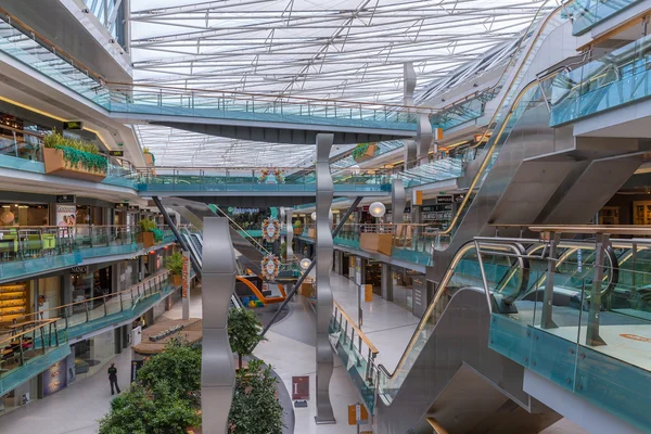 People shopping in a big Dutch indoor shopping mall