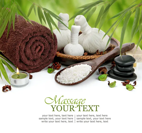 Spa massage border background with towel, compress balls and bamboo