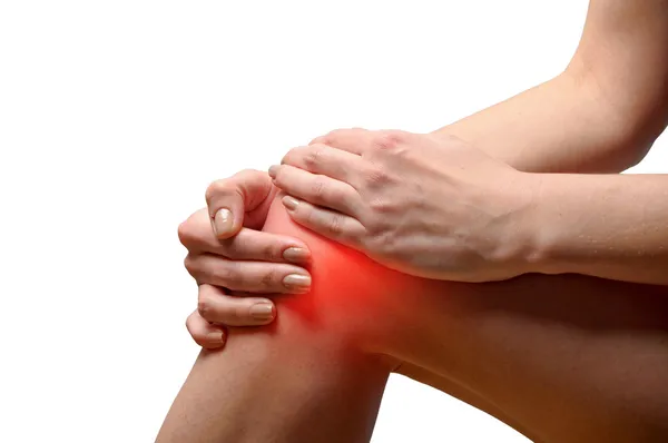 Young woman having knee pain