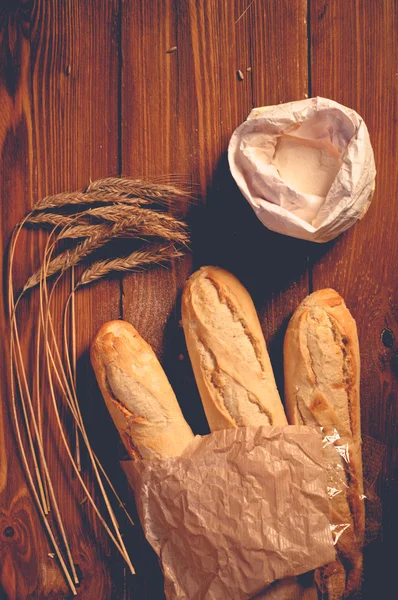 Bread on wooden boards, touch-up in retro style