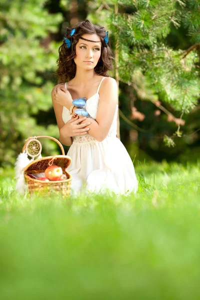 Beautiful woman on picnic on nature. Beautiful Young girl Outdoo