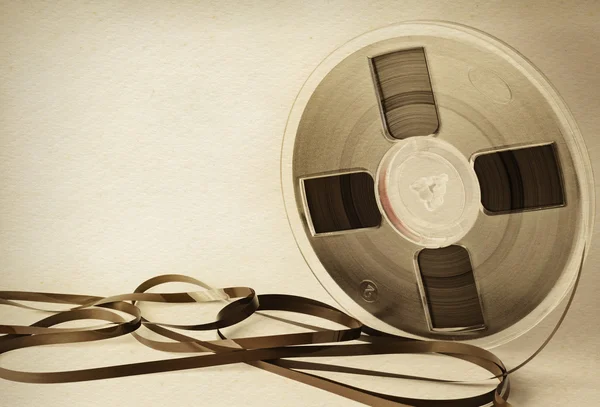 Vintage magnetic audio reel and tangled tape with space for text