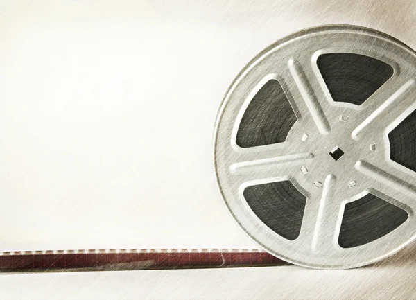 Old scratched motion picture film reel