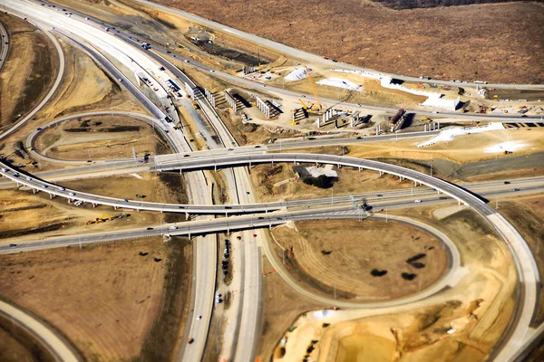 Aerial view of construction of new freeway ramp in the American