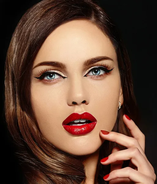 High fashion look.glamor closeup portrait of beautiful sexy stylish Caucasian young woman model with bright makeup, with red lips,  with perfect clean skin