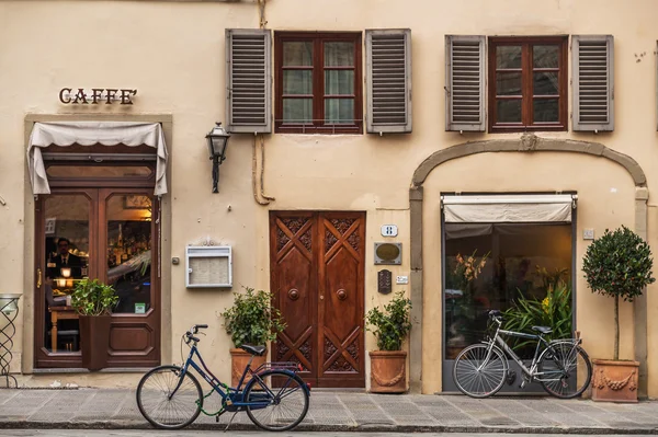 Bicycle next to caffe shope, Tuscany, Italy